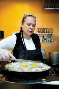 Cecilia Marchesini preparing a crepe.